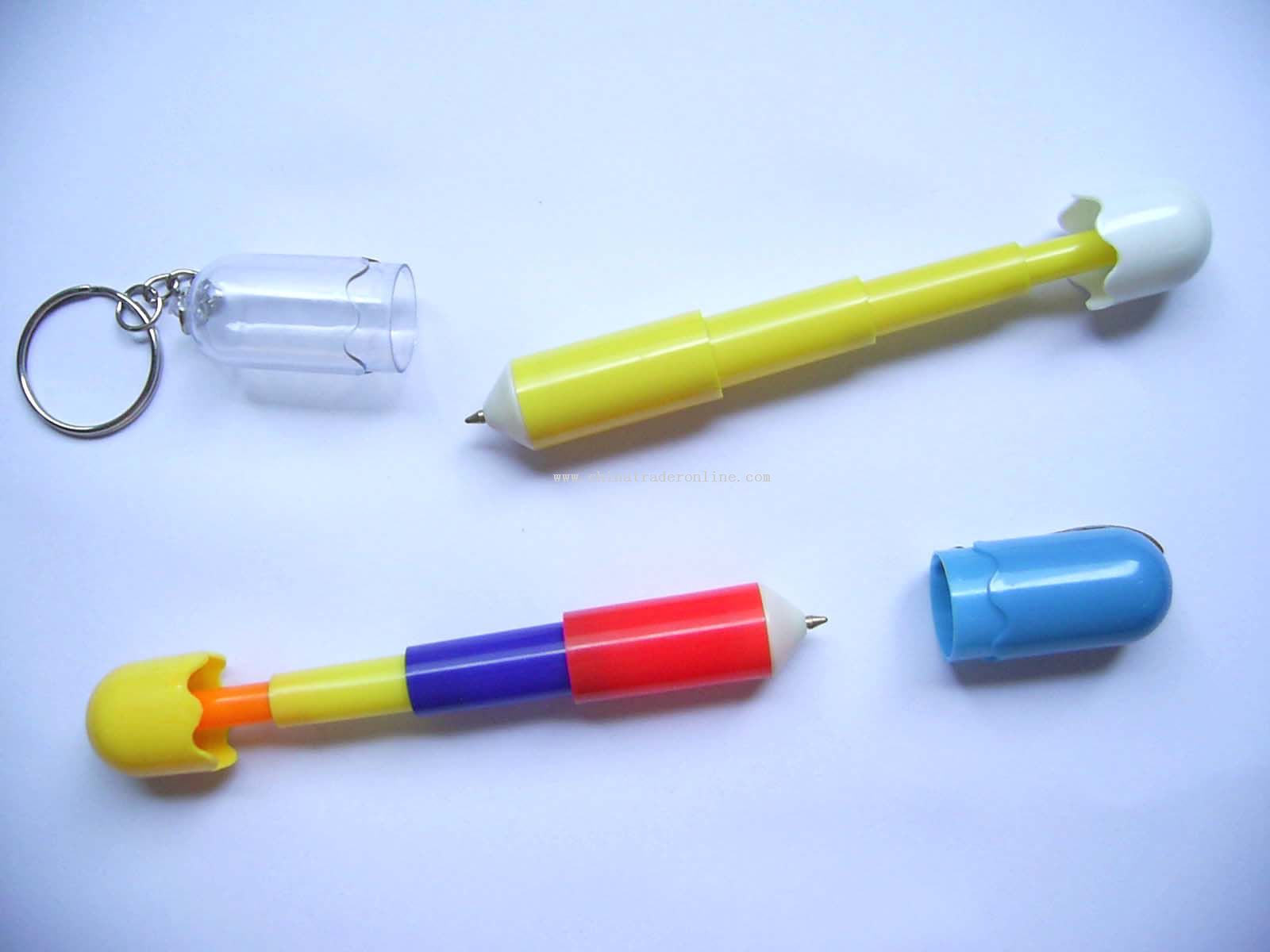 Pill shaped pen with keychain or clamp