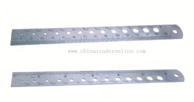 Stainless steel ruler with a drill