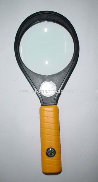 Magnifier with compass